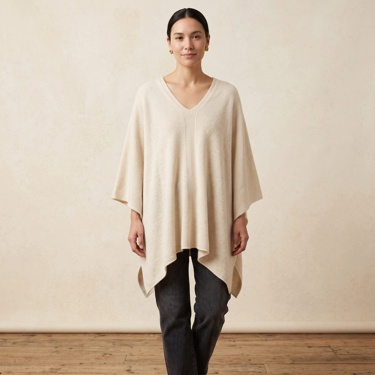Women's V-neck cashmere poncho in Off-White — worn by a model (2)