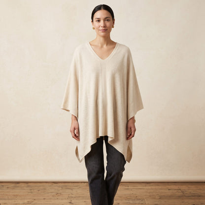 Women's V-neck cashmere poncho in Off-White — worn by a model (2)
