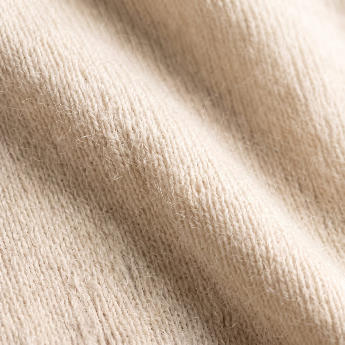 Women's V-neck cashmere poncho in Off-White — knit texture detail