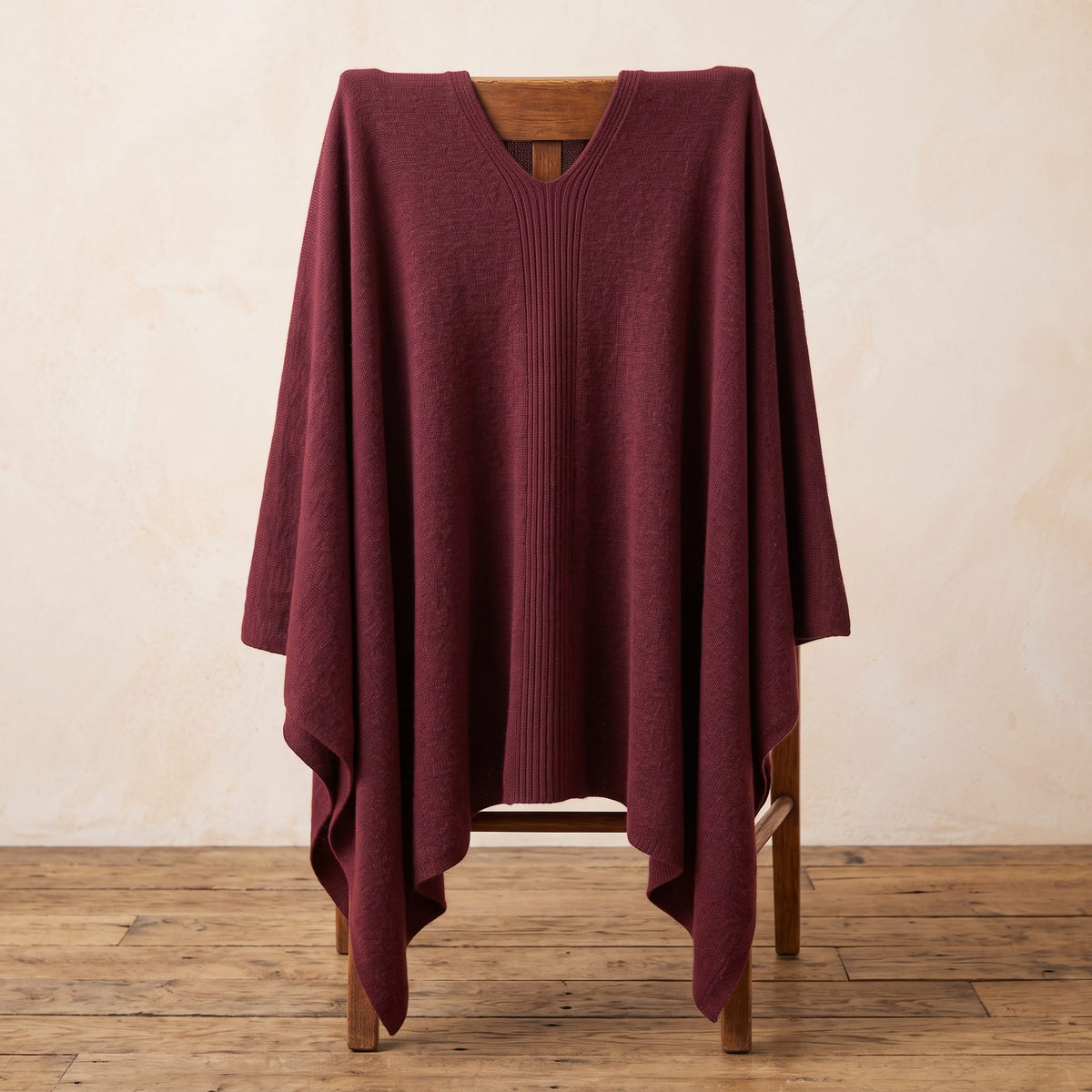 Women's V-neck cashmere poncho in Wine Red — draped