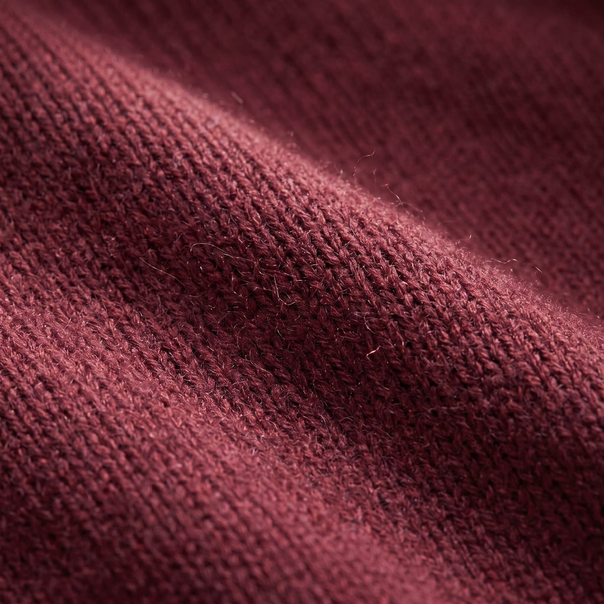 Women's V-neck cashmere poncho in Wine Red — knit texture detail