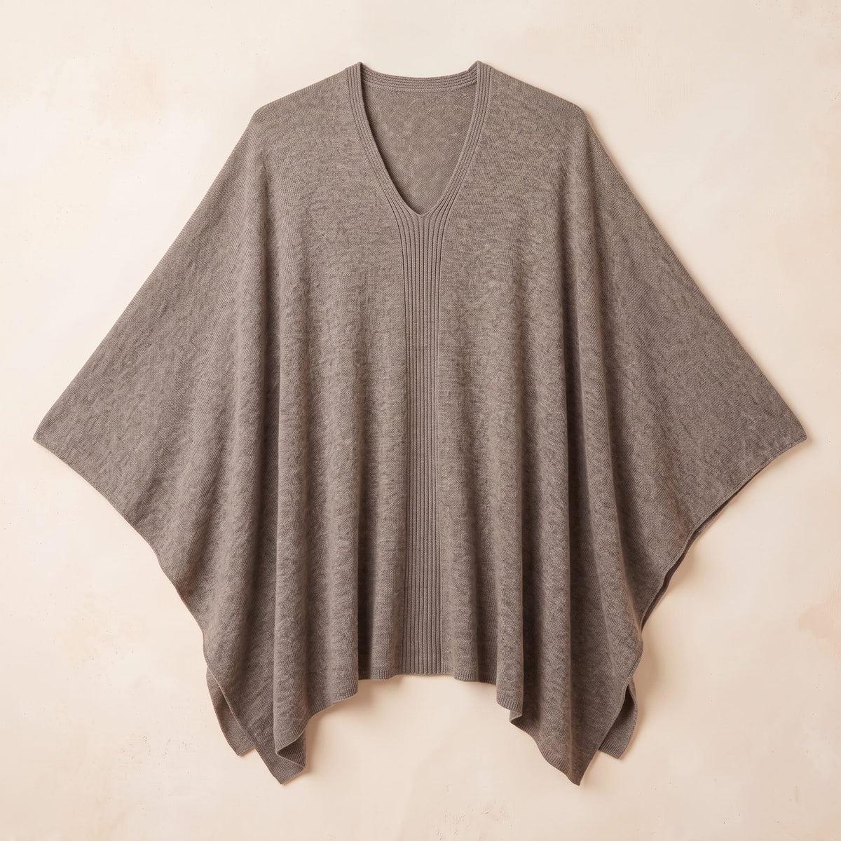Women's undyed cashmere poncho in Toast Melange — laid flat