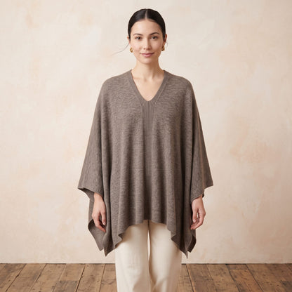 Women's undyed cashmere poncho in Toast Melange — worn by a model (2)