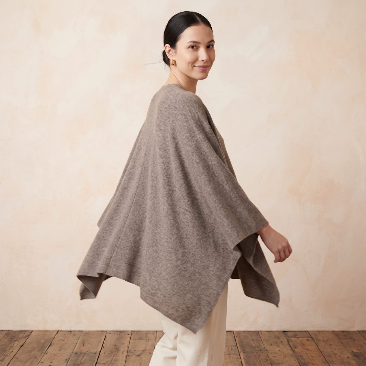 Women's undyed cashmere poncho in Toast Melange — worn by a model (3)