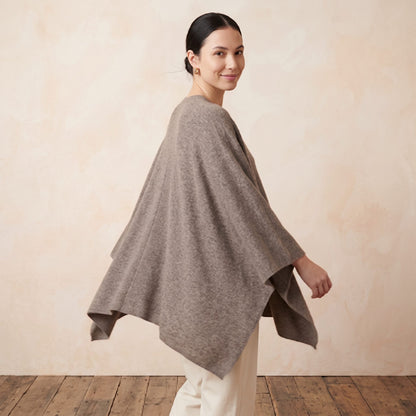 Women's undyed cashmere poncho in Toast Melange — worn by a model (3)