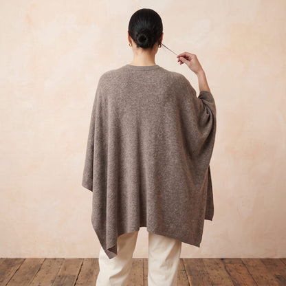 Women's undyed cashmere poncho in Toast Melange — worn by a model (4)