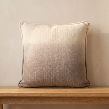 Toast Ombré 100% cashmere pillow cover, single, on a bench