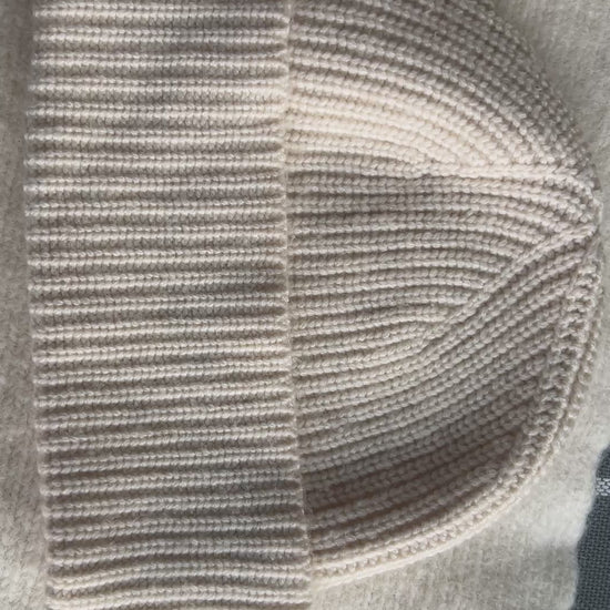 Product demonstration video of Off White Noma 100% Pure Himalayan Cashmere Hand-Knit Beanie